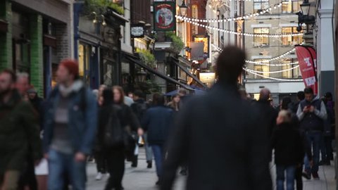 Establishing shot of crowds in London, England, Europe