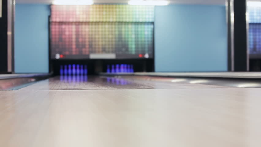 Woman is winning in a bowling game