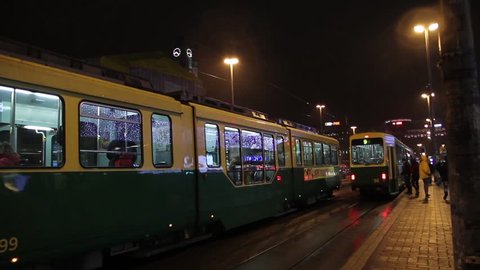 Helsinki, Finland - November 23, 2015: Tram on the streets of Helsinki, time lapse
