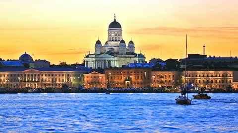 Scenic evening view of the Old Town architecture and pier with Market Square and Lutheran Christian Cathedral Church at the Senate Square in Helsinki, Finland
