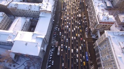 Beautiful frozen WINTER Moscow city cowered in snow and ice. From above. Road traffic jam. Aerial FPV Drone Flights. UltraHD 4K