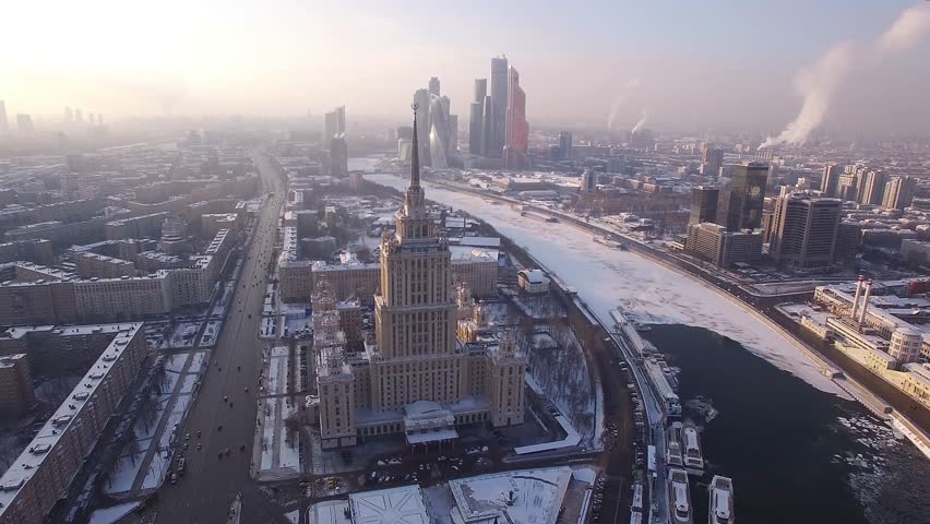 Beautiful frozen WINTER Moscow city cowered in snow and ice. Stalin skyscraper. Aerial FPV Drone Flights. UltraHD 4K | Shutterstock HD Video #14650291