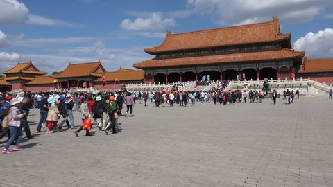 BEIJING, CHINA - 11 SEPTEMBER 2015: Tourists enter the Forbidden City complex in central Beijing, one of the most visited tourist destinations in China