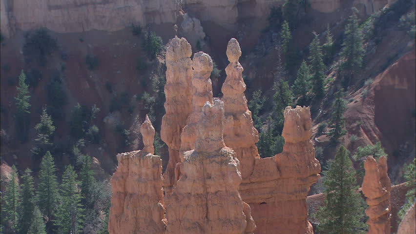 Rim lit Hoodoo Rock Formation Pull to Reveal Bryce Amphitheatre