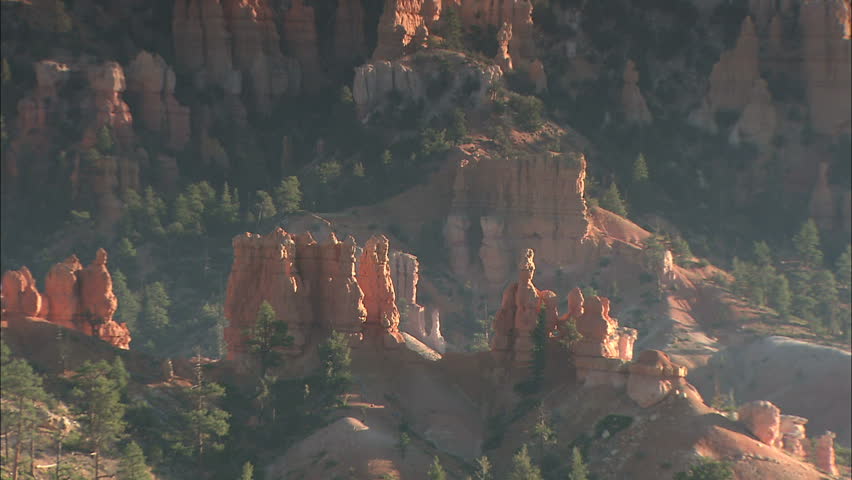 Bryce National Park Rock Formations Lit By Warm Glow of Morning Sun