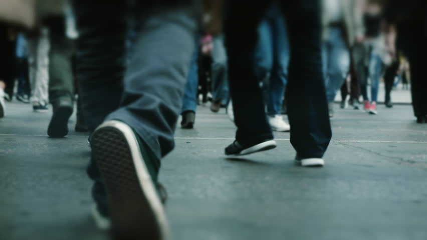 People pedestrians walk/cross big city intersection slow motion 100p.Gimbal stabilized tracking shot of an anonymous crowd mostly of young age getting across a busy city street.No logos/faces visible. Royalty-Free Stock Footage #14663800