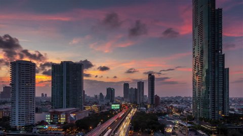 BANGKOK, THAILAND - JANUARY 2016: sunset roof top traffic street cityscape panorama 4k time lapse circa january 2016 bangkok, thailand.