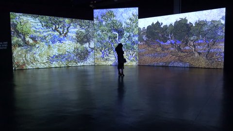 HANGZHOU, CHINA - 11 NOVEMBER 2015: Art gallery in China displays paintings of the Dutch master Van Gogh on large screens