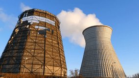Water cooling tower stack smoke over blue sky background. Energy generation and air environment pollution industrial scene. 4K UHD video footage.
