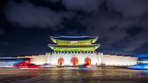 Time lapse of Gyeongbokgung palace and traffic speeds of car light at night in Seoul,South korea.
