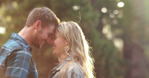 Happy Caucasian couple being romantic together in the beautiful outdoors Vídeo Stock
