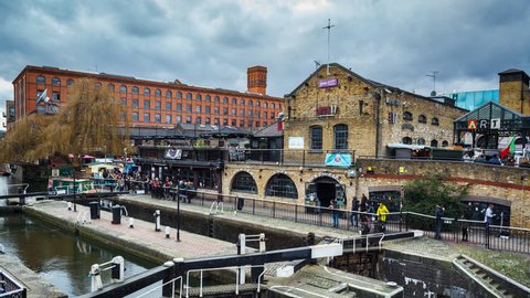 London, UK - FEBRUARY 19, 2016: Camden town Market Time Lapse with Boat.
Boathouse crossing on the channel in Camden Town, London.