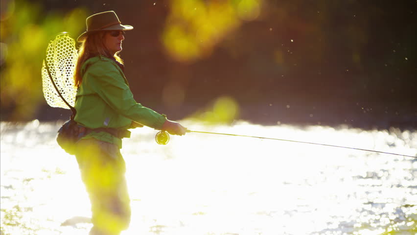 Skilled hobby female casting line freshwater fishing USA