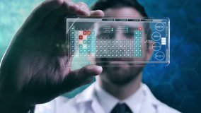 Caucasian American doctor using touchscreen technology showing periodic elements - Powered by Shutterstock - Get 15% off with code: PIKWIZARD15