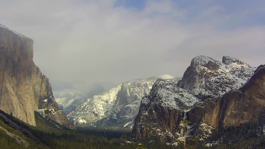 Yosemite Valley with cloud coverage and snow