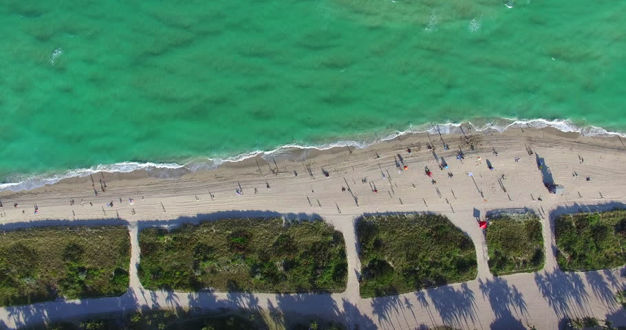 Aerial 4K video. Beaches and city park from above. North Shore Open Space Park, Miami Beach, Florida 