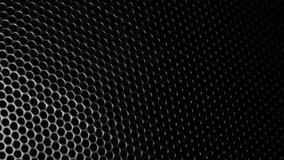 Metallic grid motion background. Dark metal background with perforated holes. 4K 3840x2160 UHD video.