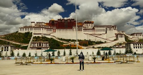 Oct 09,2015:4k busy traffic & crowd in front of potala in lasa,stand guard in potala square,tibet. gh2_09741_4k