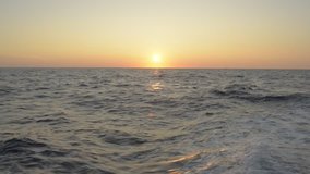 sunset video in deep sea by sailing vessel