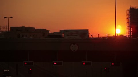 Doha, Qatar - 2011 - Sunset on a motorway overpass.