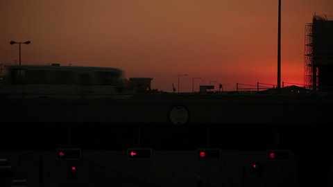 Doha, Qatar - 2011 - Sunset on a motorway overpass.