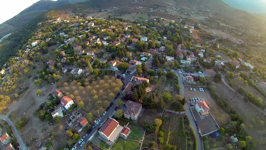 Eski Datca Village from above. Summer vacation, a favorite for south-western trips in Turkey Country. Aerial of rural landscape and the mountains on the background. 
 Royalty-Free Stock Footage #14751712