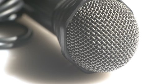 Detailed view of a head of a classic handheld microphone steel grid