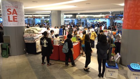 SEOUL, SOUTH KOREA - 9 OCTOBER 2015: People are looking for bargains in a popular Lotte Mart shopping mall in Seoul, South Korea