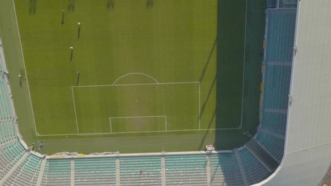 Aerial, playing and kicking ball around at Soccer Stadium
