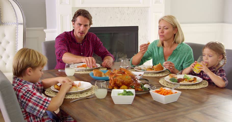 Family Sitting Around Table Eating Stock Footage Video (100% Royalty-free) 14756761 | Shutterstock