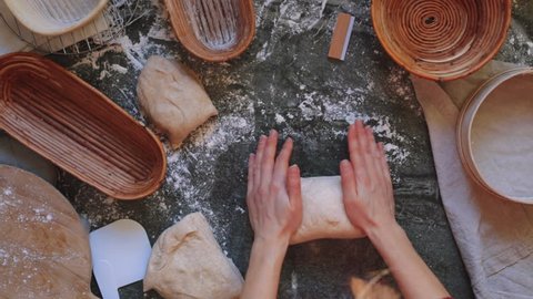 Time-lapse of a artisan baker preparing organic sourdough bread.