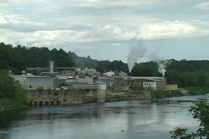 Factory next to a river in Maine. 