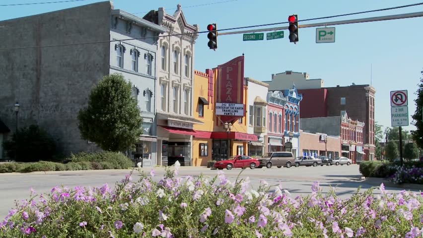 A park bench and Main Street in the all American town of Ottawa Kansas.