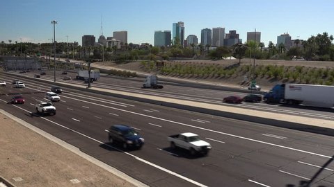 I-10 freeway timelapse of traffic with downtown Phoenix, Arizona in the background
