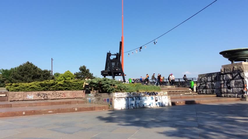 A teenager is trying to make a perfect jump on the skateboard