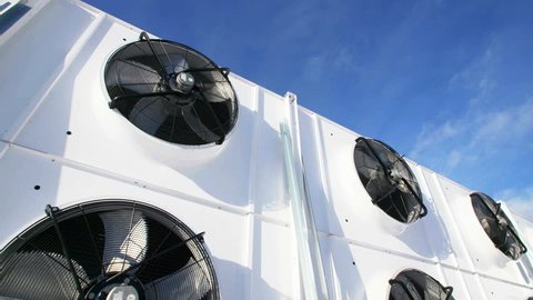 New Industrial large air conditioning fans on the background of blue sky