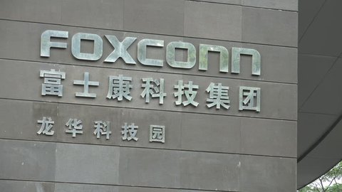 SHENZHEN, CHINA - 21 NOVEMBER 2015: Logo of the Foxconn group at its main industrial park in Shenzhen, China