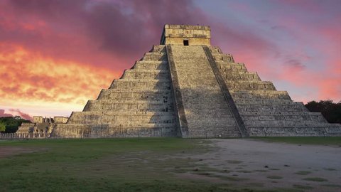 chichen itza kukulkan temple at sunset colorful sky no people dolly lateral movement