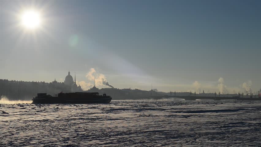 The icebreaker floats along the Neva River in the winter in St. Petersburg