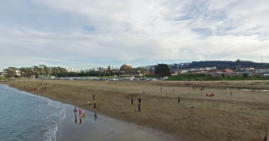Beautiful 4k view on San Francisco beach, USA, California. People walking on a sand. Made with Inspire 1 drone.