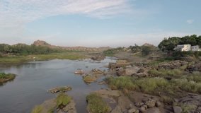 4K / HD Aerial Footage . India, Hampi. Originally shot in 4K on GoPro Hero 4 Black with Protune mode on in 3840x2160 25p. River in Hampi. Shooting Air.