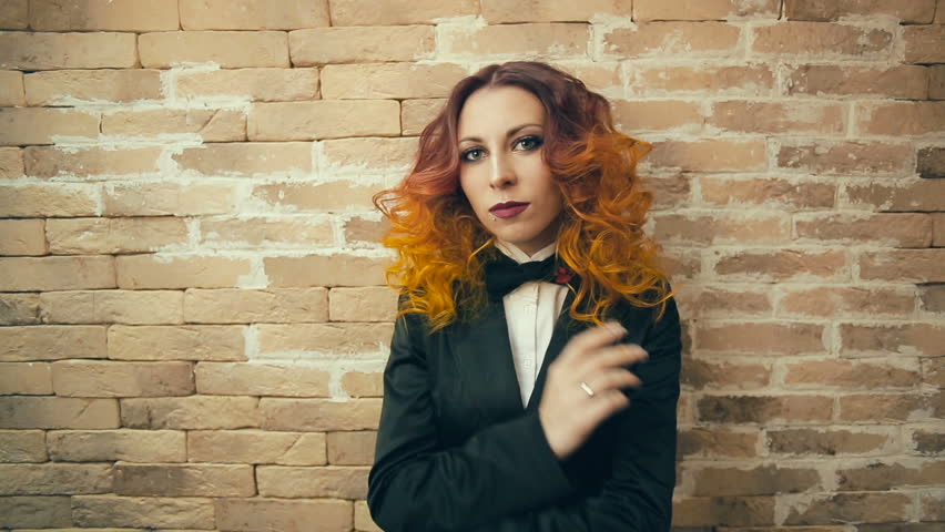 Portrait of Serious Redhead woman