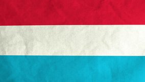 Luxembourger flag waving in the wind (full frame footage in 4K UHD resolution)
