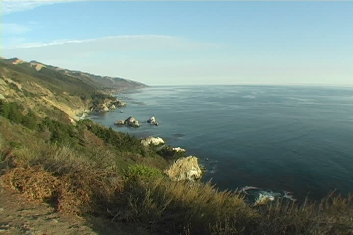 Wide shot of the Big Sur coastline in the evening.