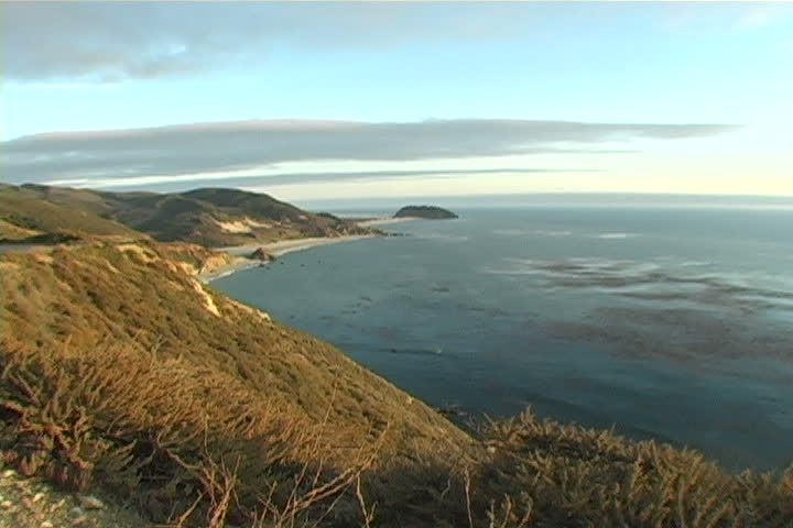 Wide shot of the Big Sur coastline in the evening.