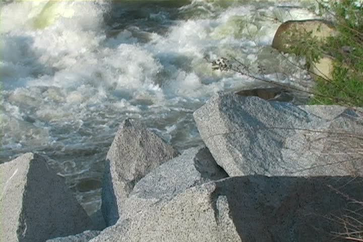 A slow zoom-out of the kern river which is famous for it rapids and whitewater