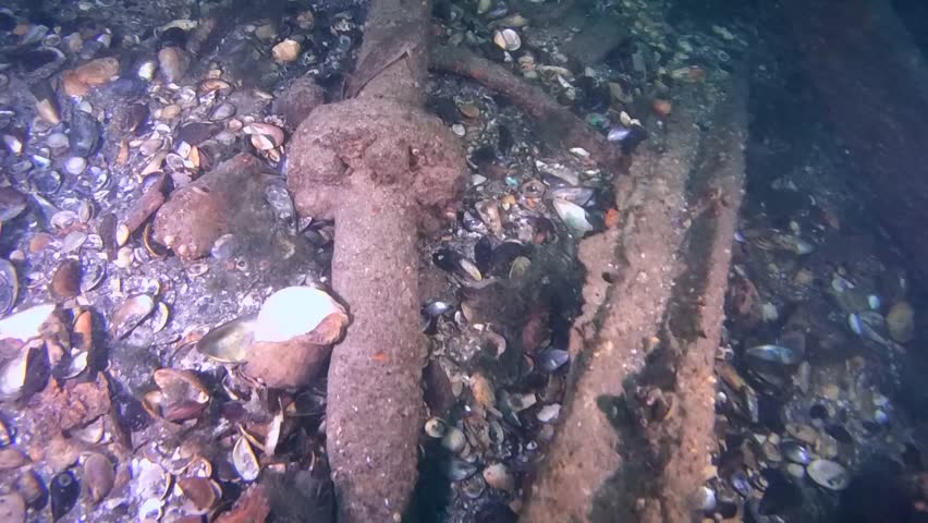 Movement along the pipeline on the deck of the sunken ship.
