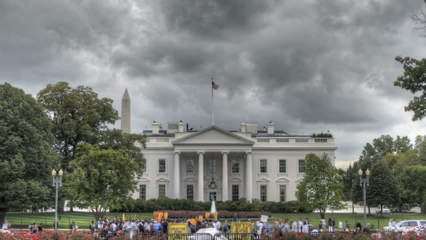 Demonstration in front of the White House with dark clouds on September 21, 2011