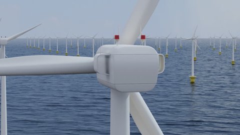 Camera rotates around a single wind turbine in an offshore wind farm. Seamless loop.
