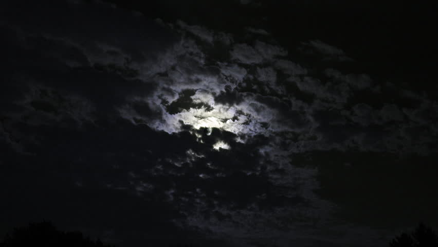 Full moon time lapse with fast moving clouds